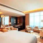 Indulge in a luxury hotel suite with elegant decor and sophisticated furnishings.